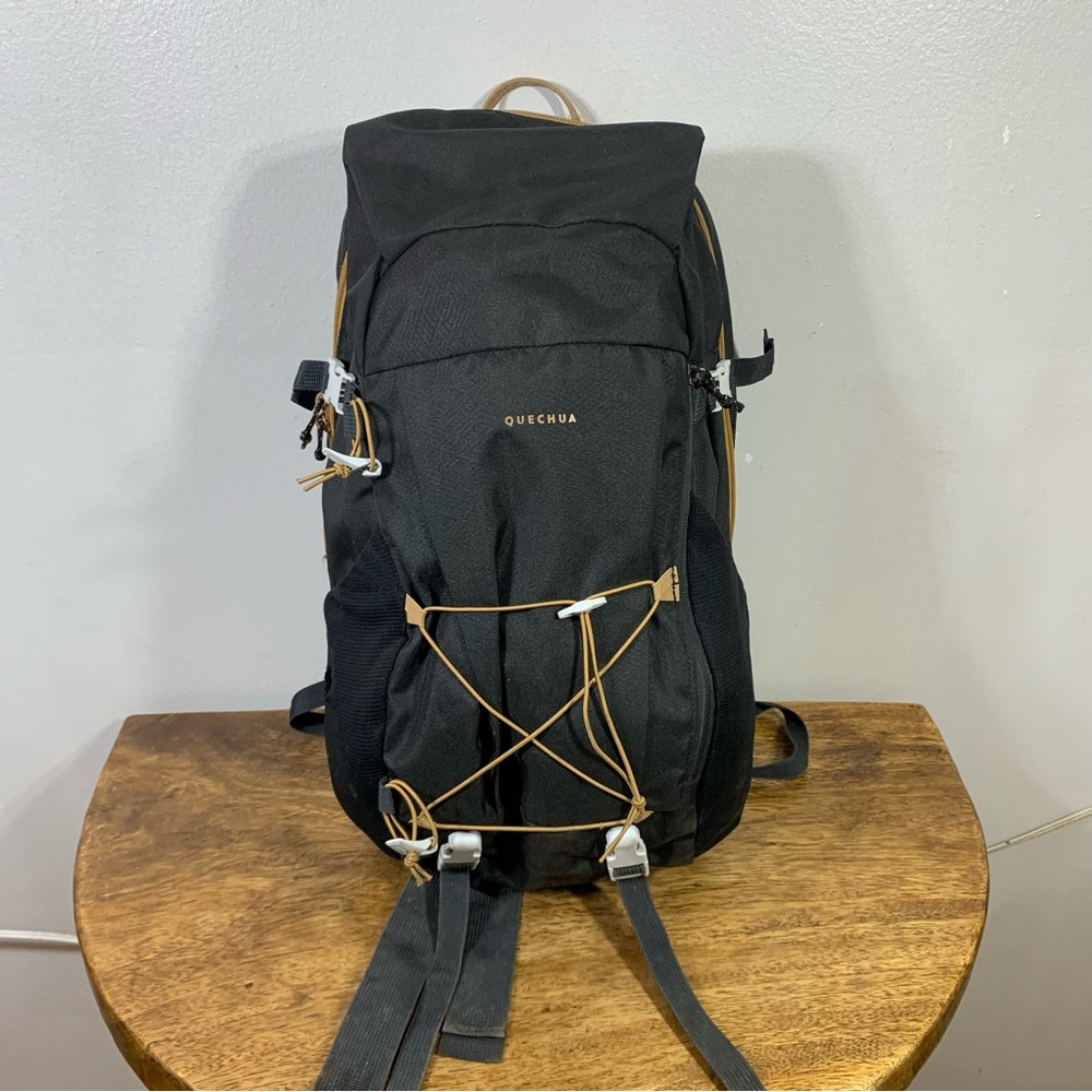 Quechua Black Backpack with Tan Accents